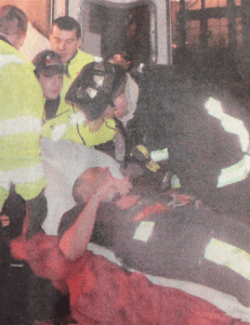 Captain Pronesti receiving aid after exiting the tunnel fire where he ran out of air.